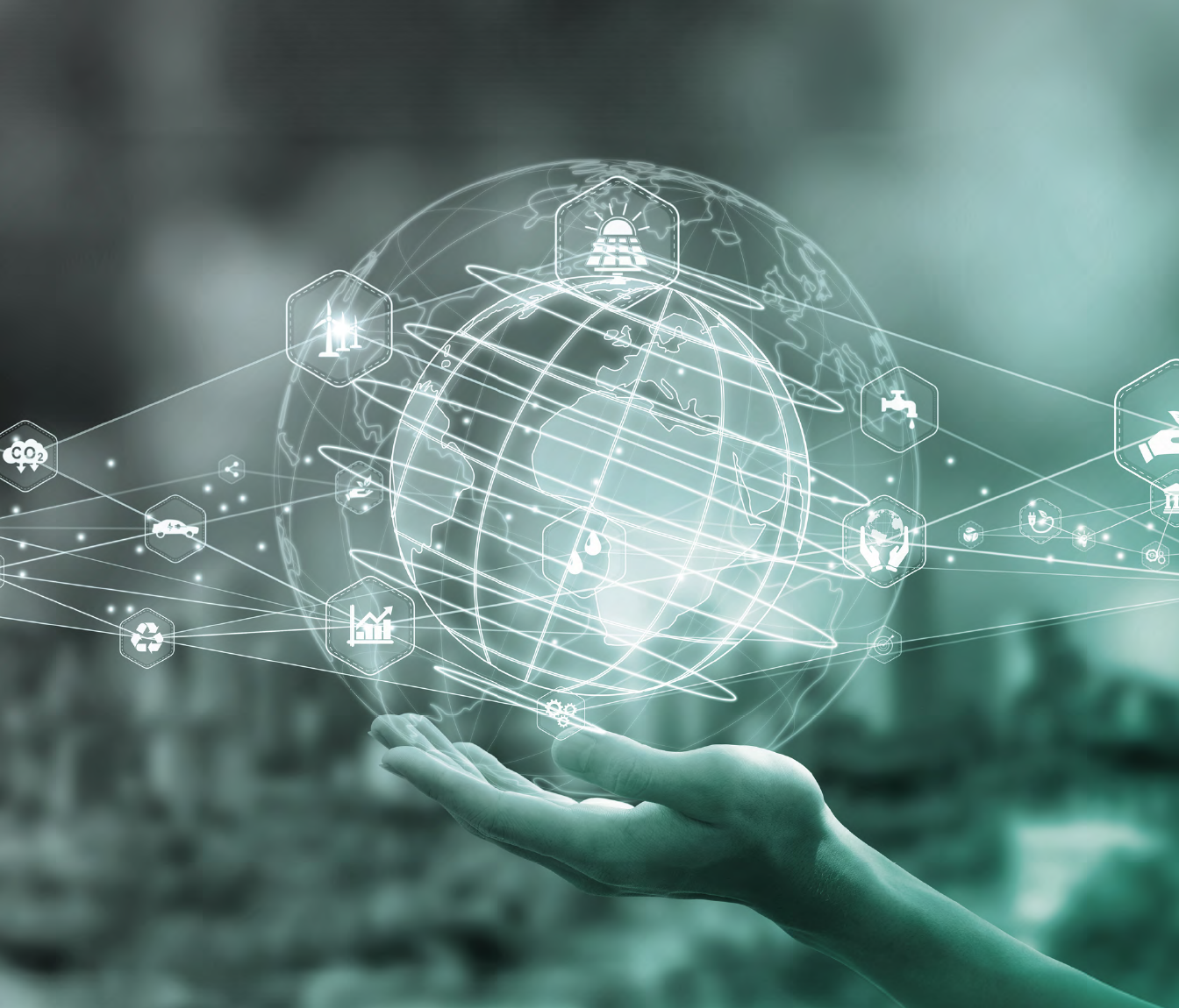 A Globe with a hand under it.